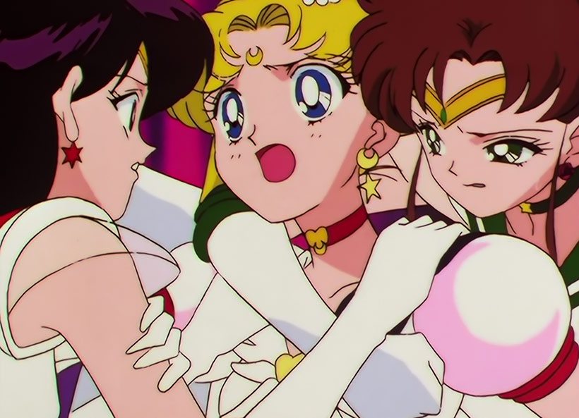 Sailor Moon Sailor Stars Part 2, Sailor Moon being held back by Sailor Mars and Sailor Jupiter
